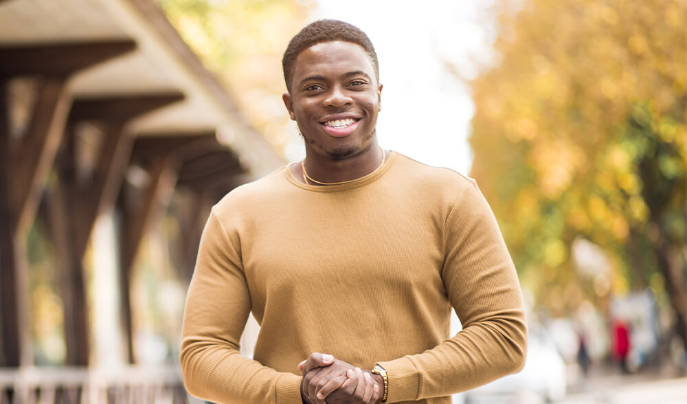 Smiling man outside