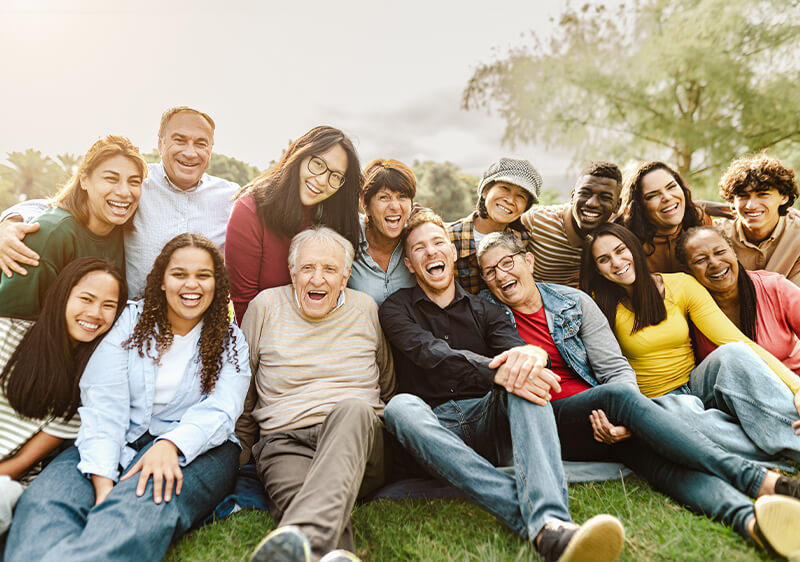 Group of Local Community individuals smiling and enjoying care from 2CPP